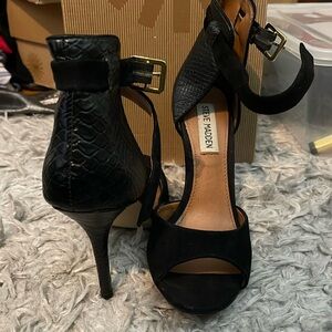 Size 6 Steve Madden heels with snake print ankle strap.